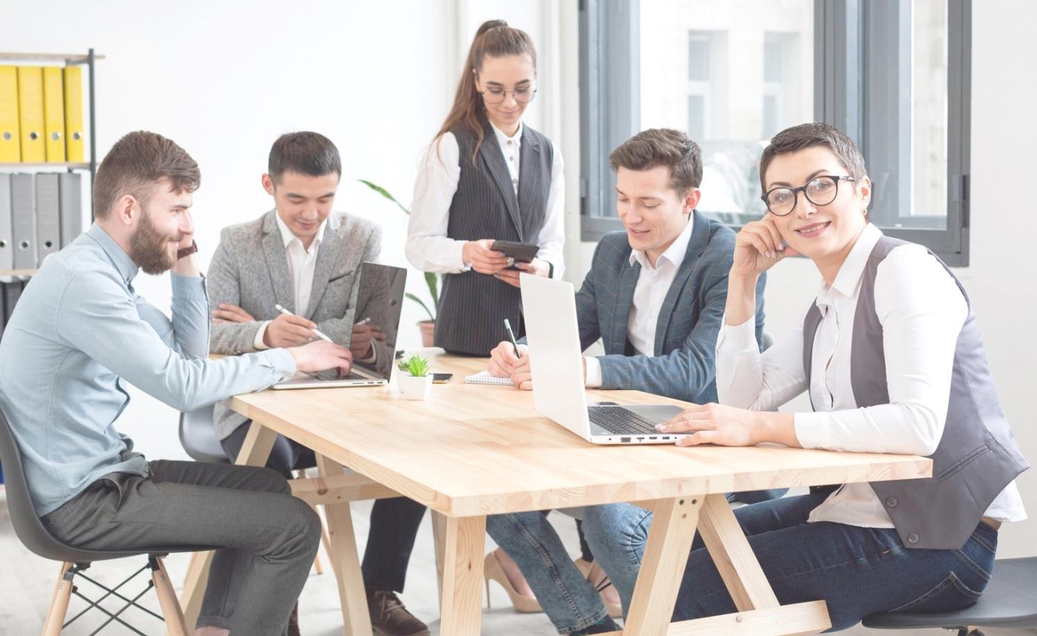 Financial professionals analyzing strategic planning documents and market data